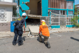 Guánica, PR,  February 4, 2020 -- A team of engineers and specialists go door to door to assess each structure to evaluate its stability after the earthquake.  Photo by Liz Roll/FEMA