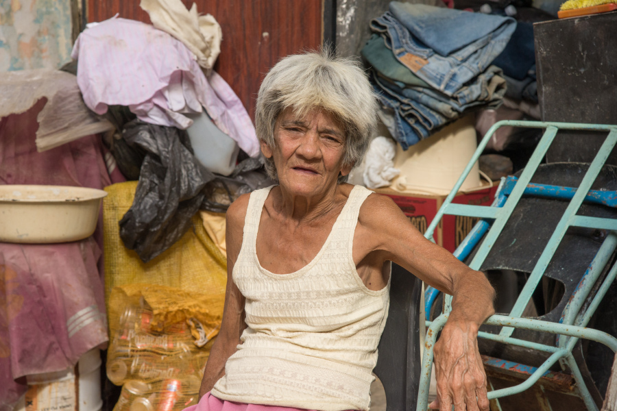 Havana, Cuba - It is said there are no homeless people in Cuba because the government provides, but this woman lives with her son in a  shack inside an abandoned lot.